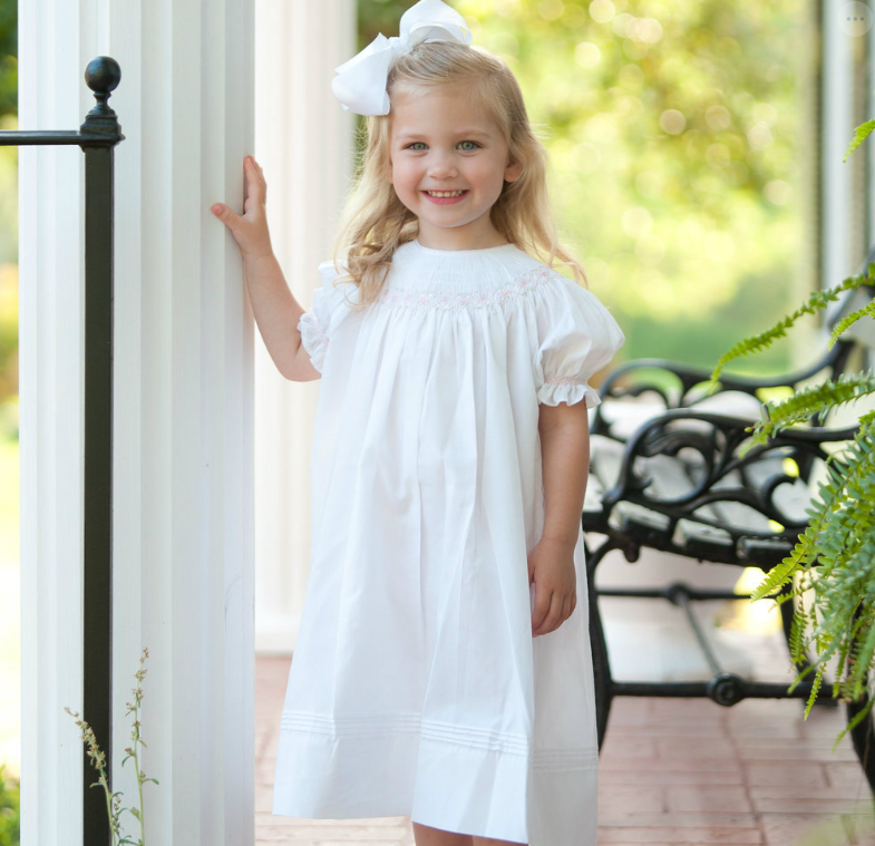 This pretty smocked dress looks just like Free People's popular design —  but it's just $30 on